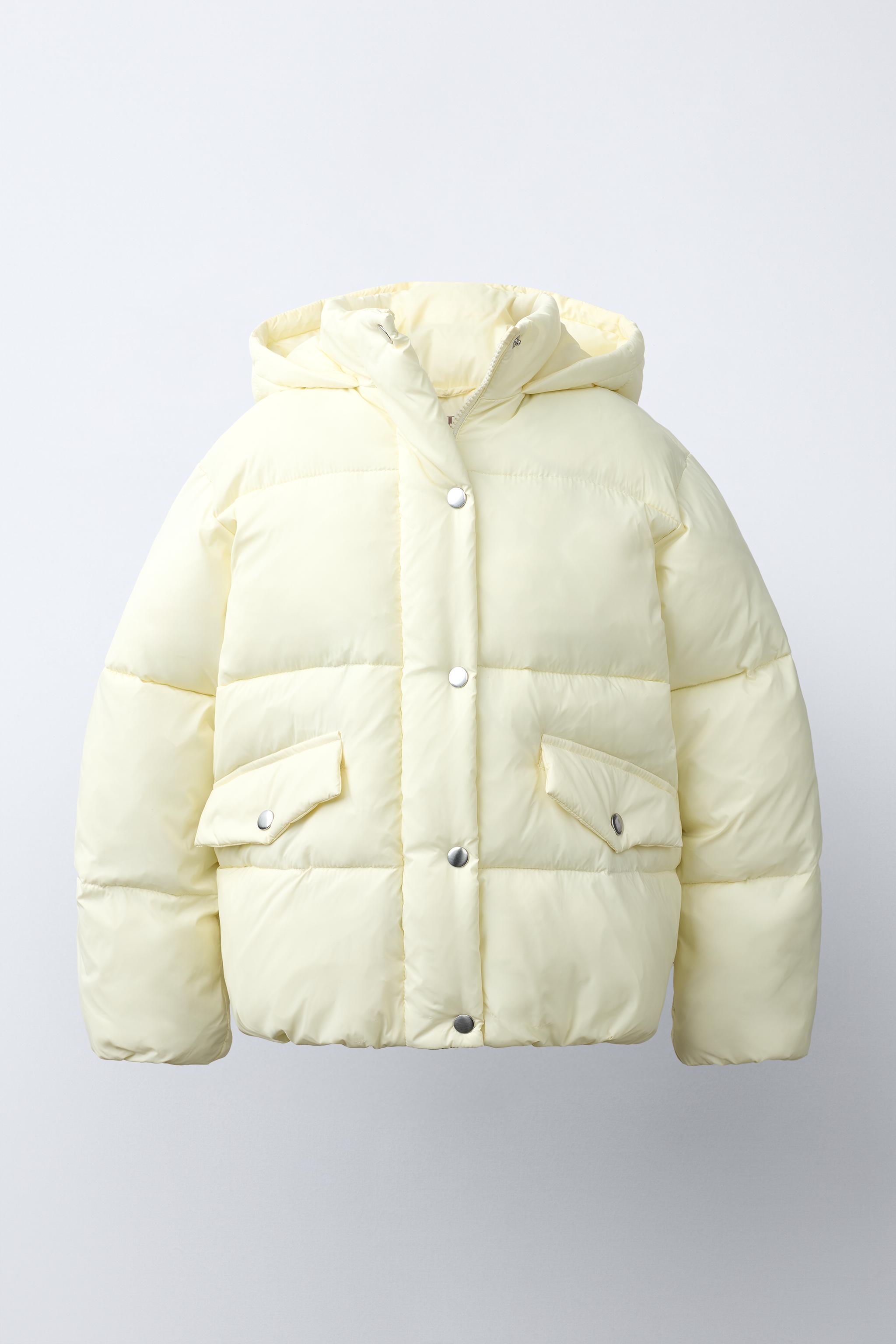 BLOUSON MATELASSÉ À CAPUCHE DÉPERLANT